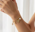 Bracelet charms coeur mystique Soleil & Lune - Chaîne dorée ajustable