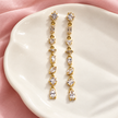 Boucles d’oreilles Prisme Doré – Transparent