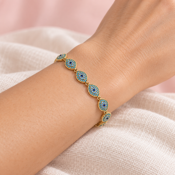 Bracelet Nazar doré à motifs œil – Turquoise porté au poignet